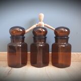 Trio round brown apothecary bottles