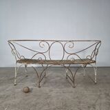 Beautiful curved garden bench from the late 19th century in iron.