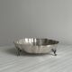 Silver-plated metal basket on rockwork feet