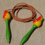 Old wooden jump rope toy painted in the shape of pear fruit ref