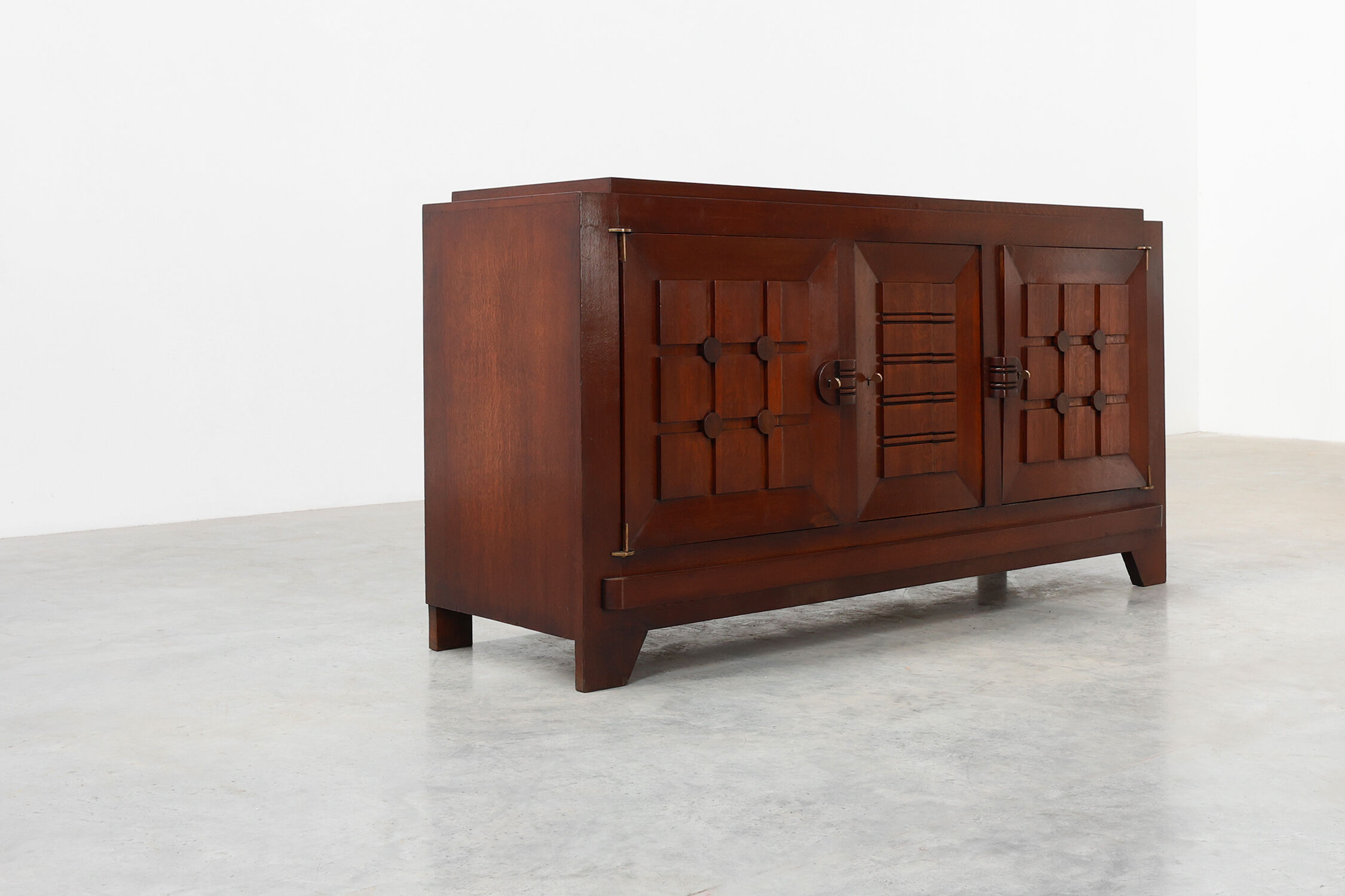 Art Deco carved geometric sideboard by Charles Dudouyt in oak, France ca. 1