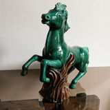 Cheval en faïence verte