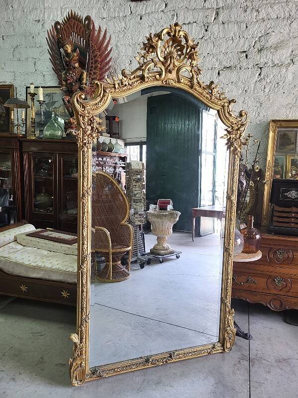 Large Louis XV gilded shell mirror from the 19th century