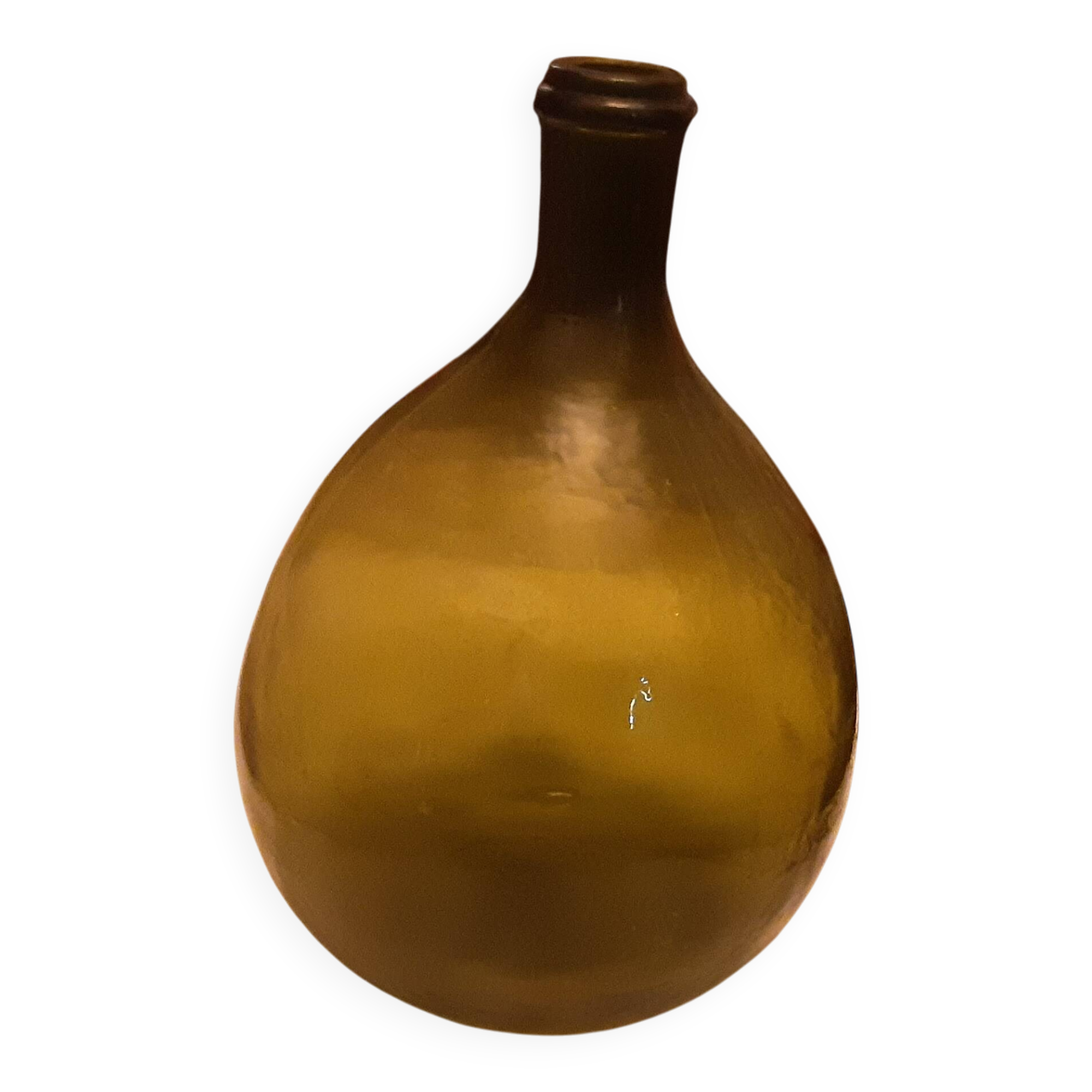 Old green glass demijeanne