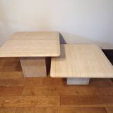 Pair of nesting travertine coffee tables