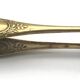 Sugar or ice cube tongs, gold star stamp with lion paw finish