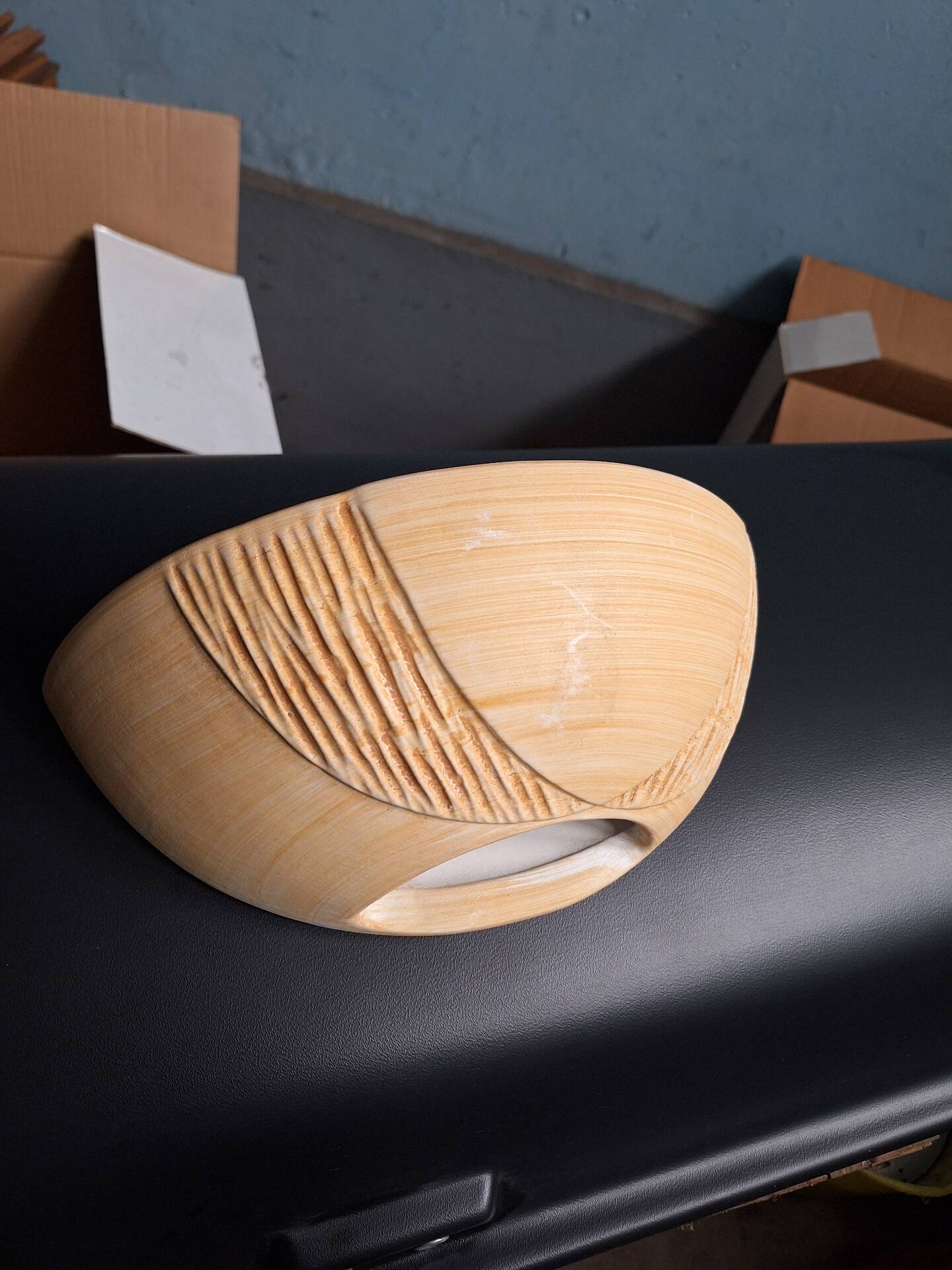 Yellow stoneware half-moon wall light
