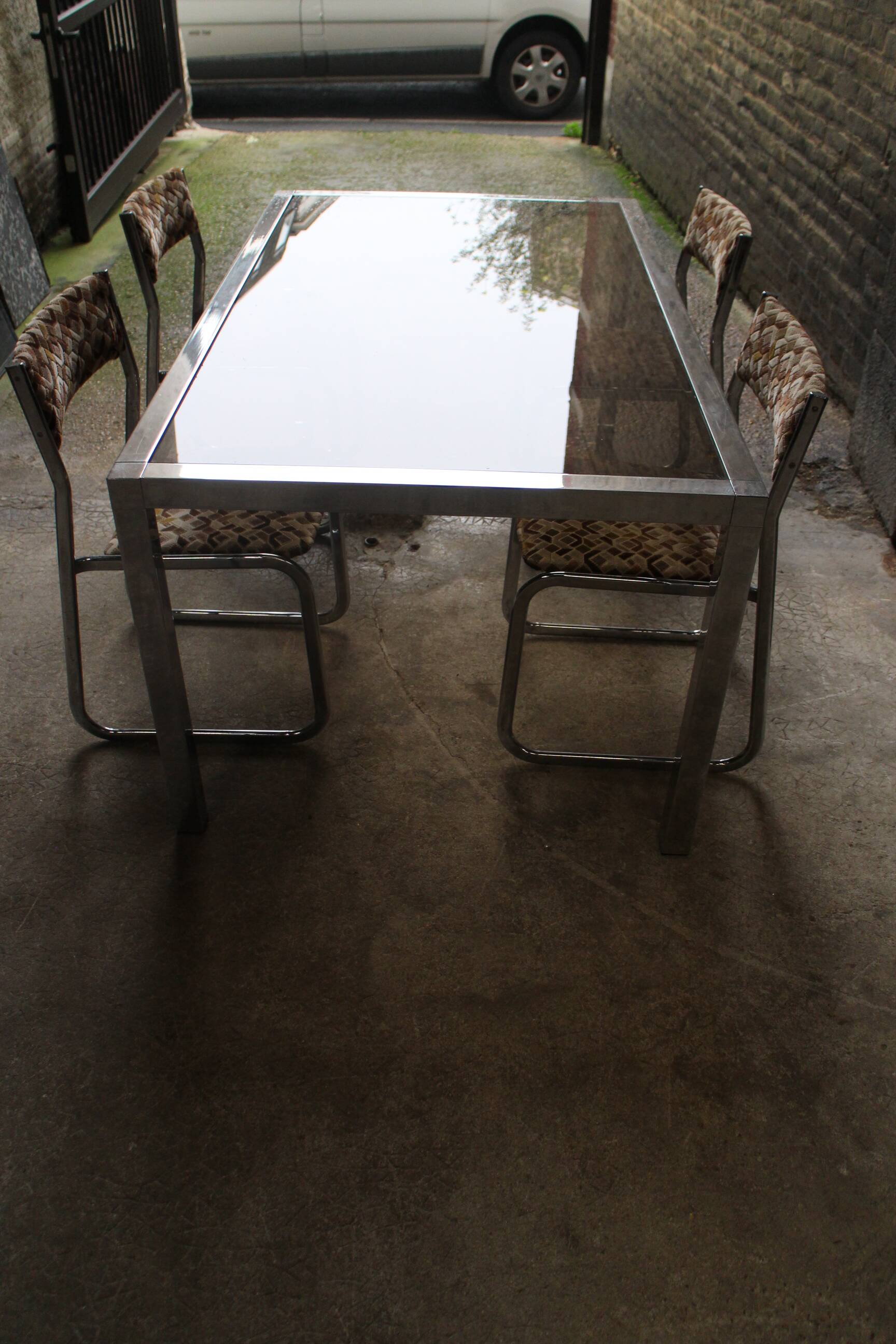 Vintage table chrome legs and smoked glass top