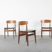 4 chaises en teck et similicuir, milieu XXème