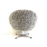 Grey swivel armchair with metal star base made in the 70s