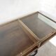 Oak and brass-mounted display cabinet on legs – Circa 1950
