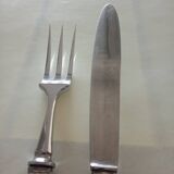 Serving cutlery in silver metal