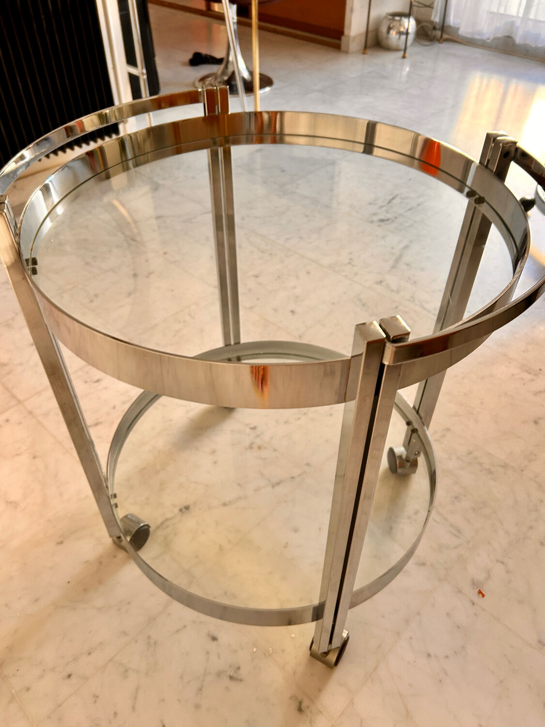 Vintage round dessert trolley in chrome steel, with two glass shelves.