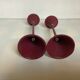 Paire de bougeoirs bordeaux vintage