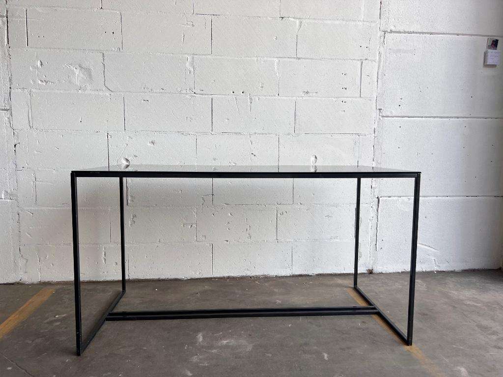 Coffee table in glass and iron