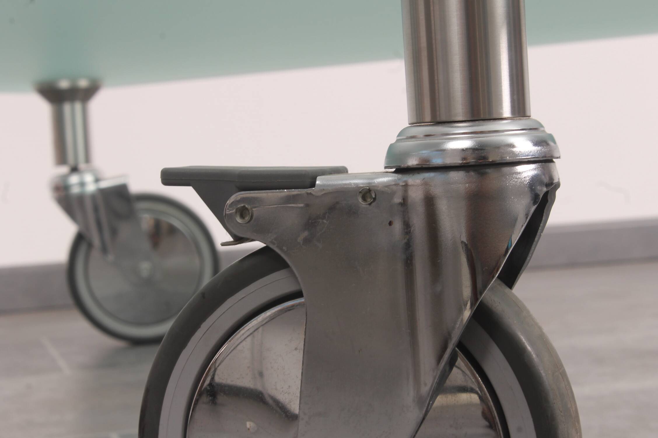 Wheeled glass coffee table