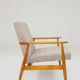 Fauteuil scandinave en tissu tressé beige