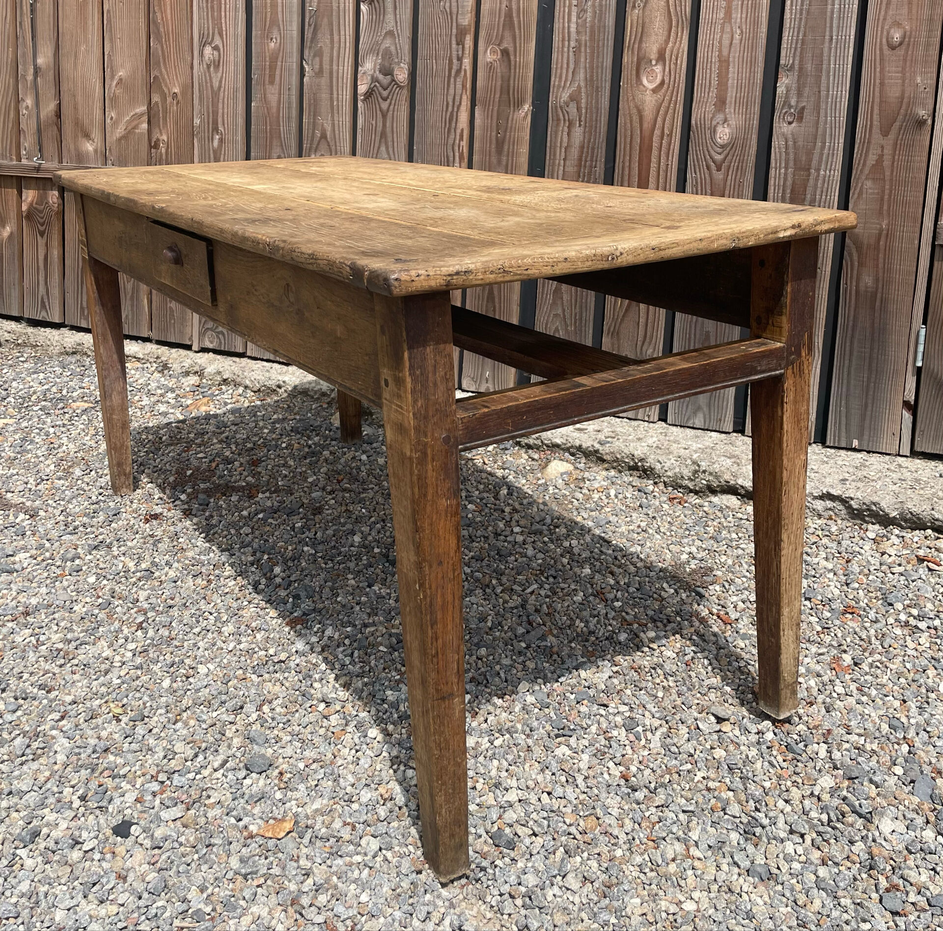 Solid oak farmhouse table with 2 drawers.