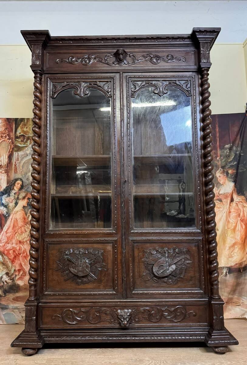 Renaissance style hunting lodge library in carved oak circa