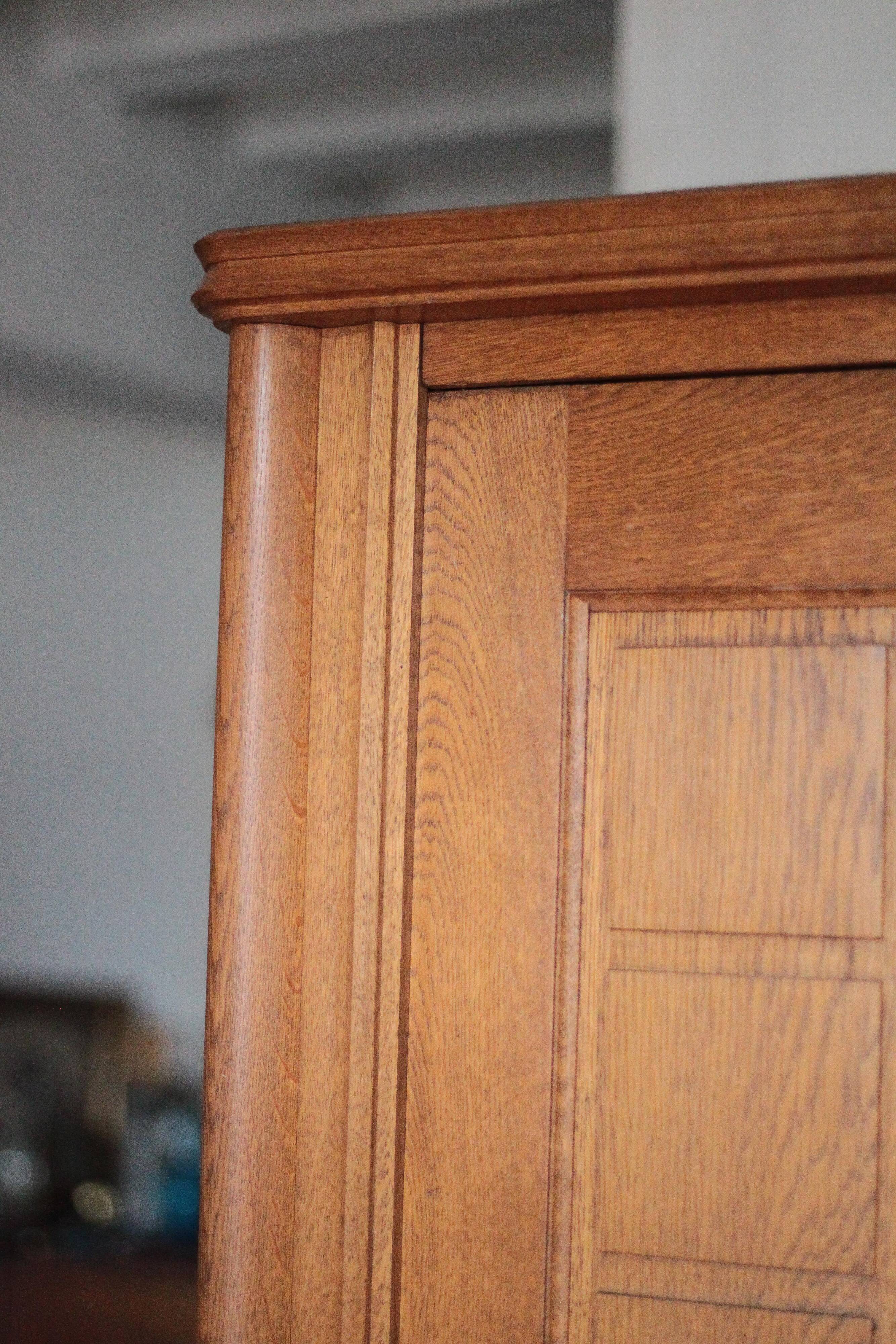 Vintage wooden wardrobe with sliding doors.