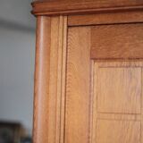 Vintage wooden wardrobe with sliding doors.