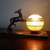 Art deco table lamp, marble, opaque glass and granite, animal in bronze patinated regulator