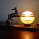 Art deco table lamp, marble, opaque glass and granite, animal in bronze patinated regulator