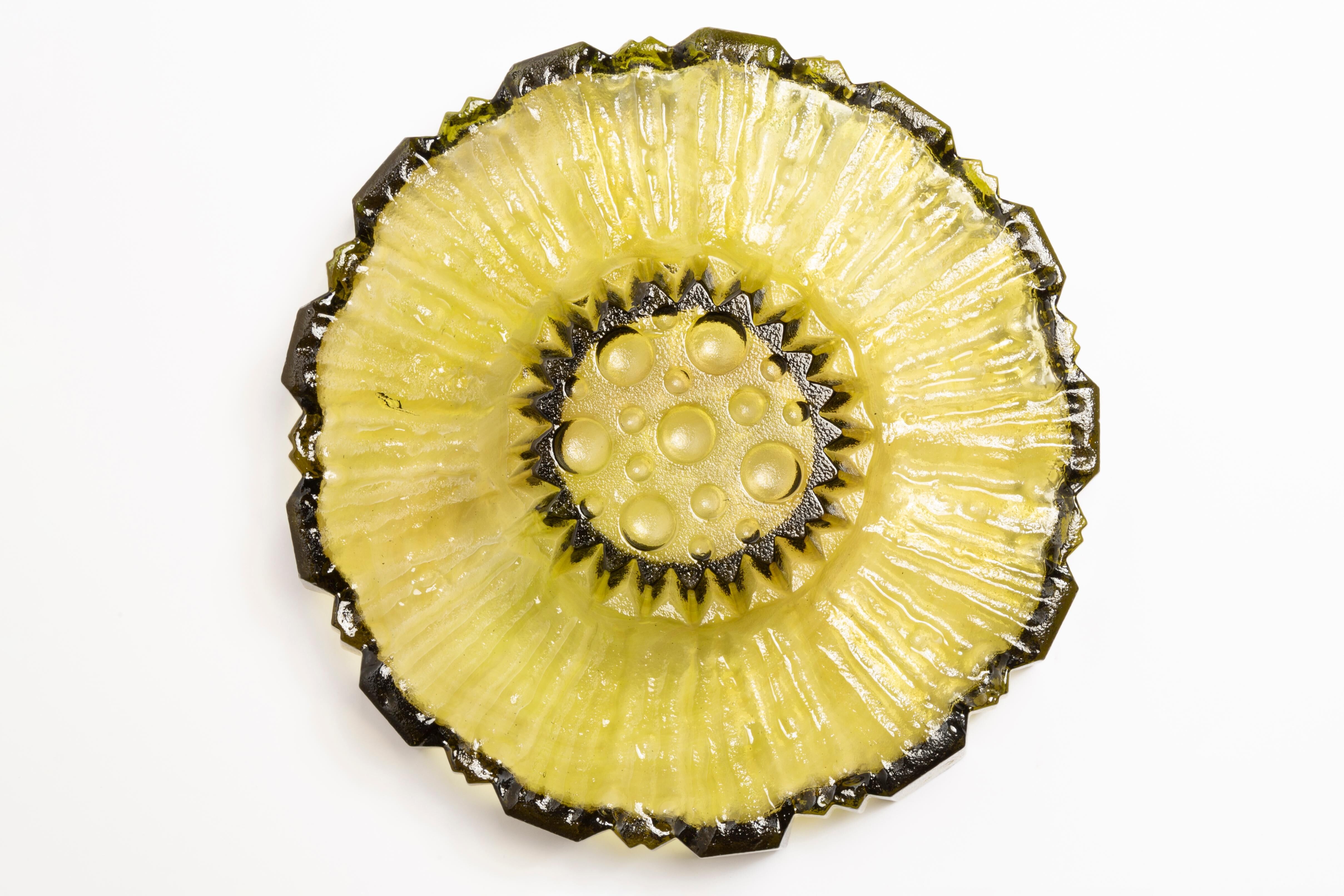 Decorative green glass flower-shaped plate, Italy, 1960s.