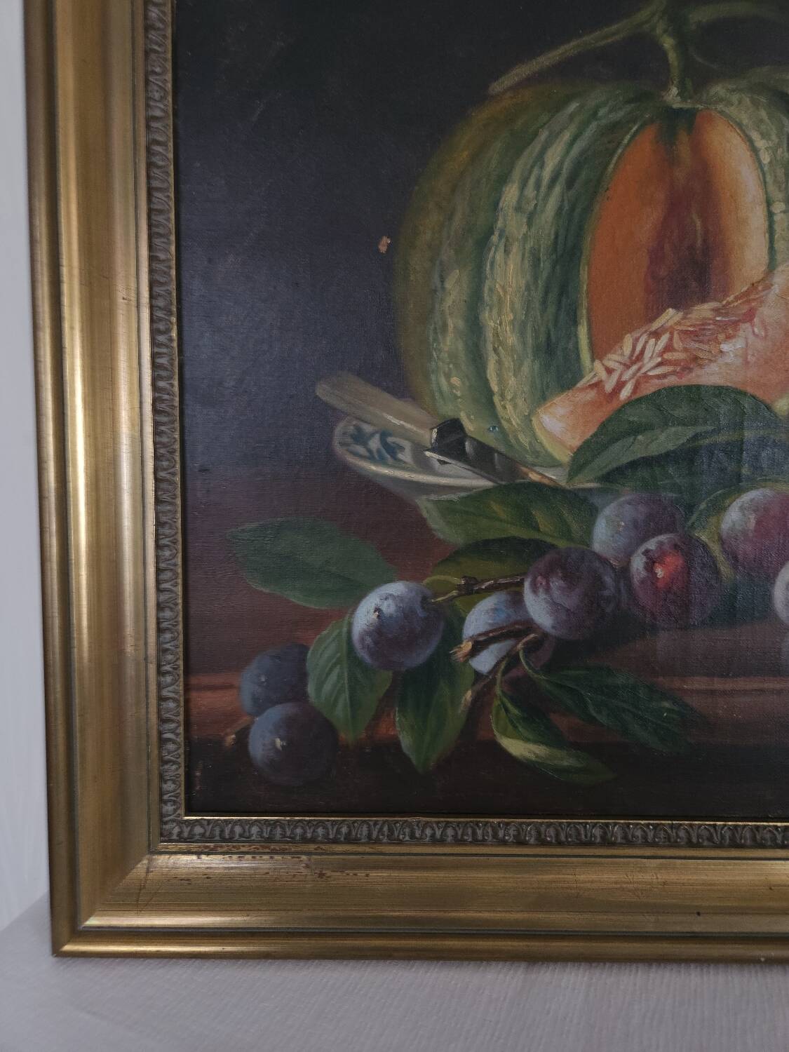 Still life, oil on canvas, melon and grapes.