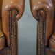 Set of 2 club armchairs in sheepskin leather with black piping