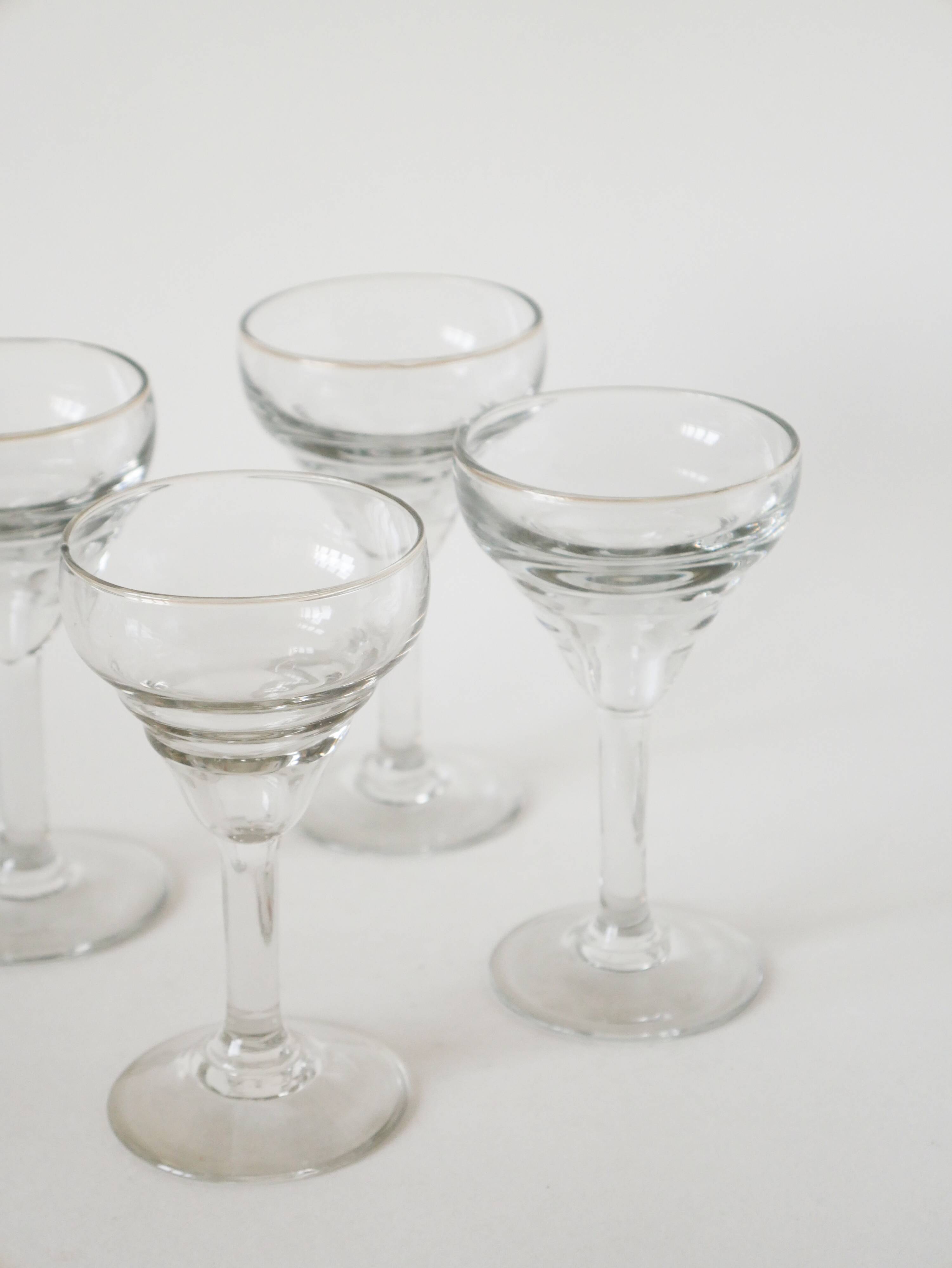 Set of 4 moulded glass wine glasses, 1920