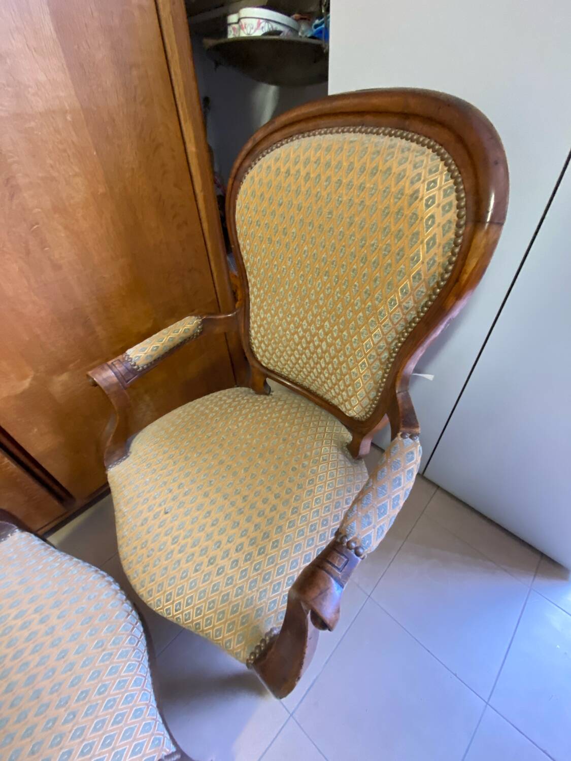 Two Louis XV style wooden and fabric armchairs