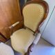 Two Louis XV style wooden and fabric armchairs