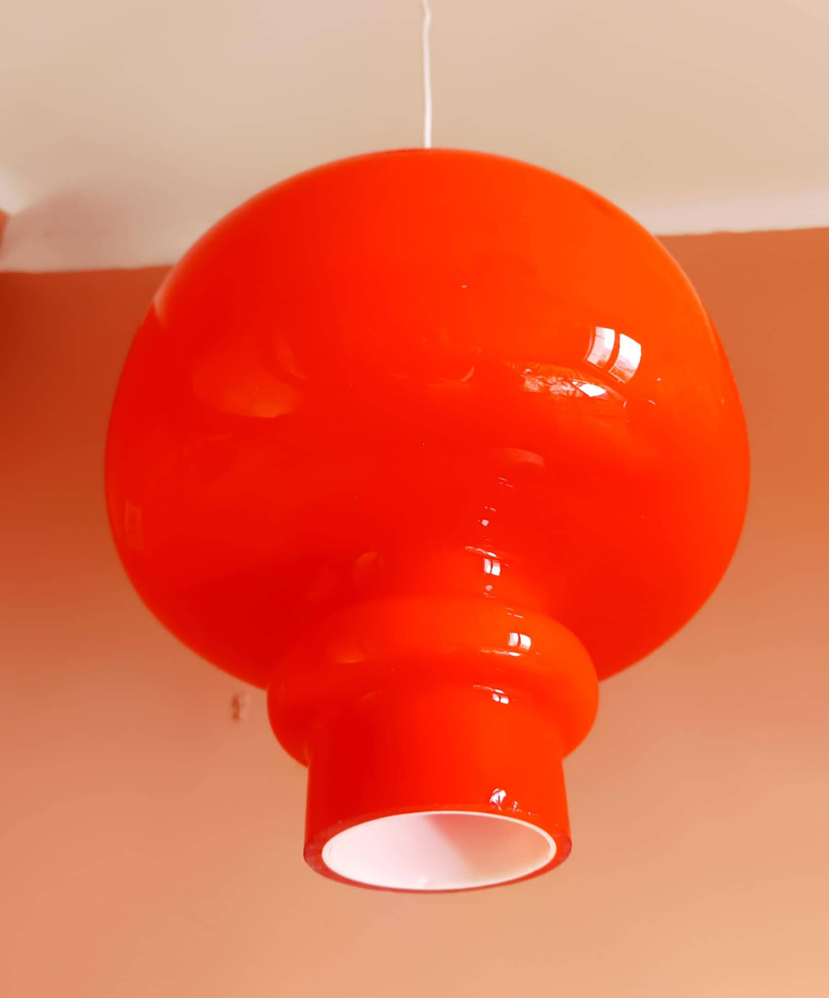 Pair of orange pendant lights by Hans-Agne Jakobsson, 1960
