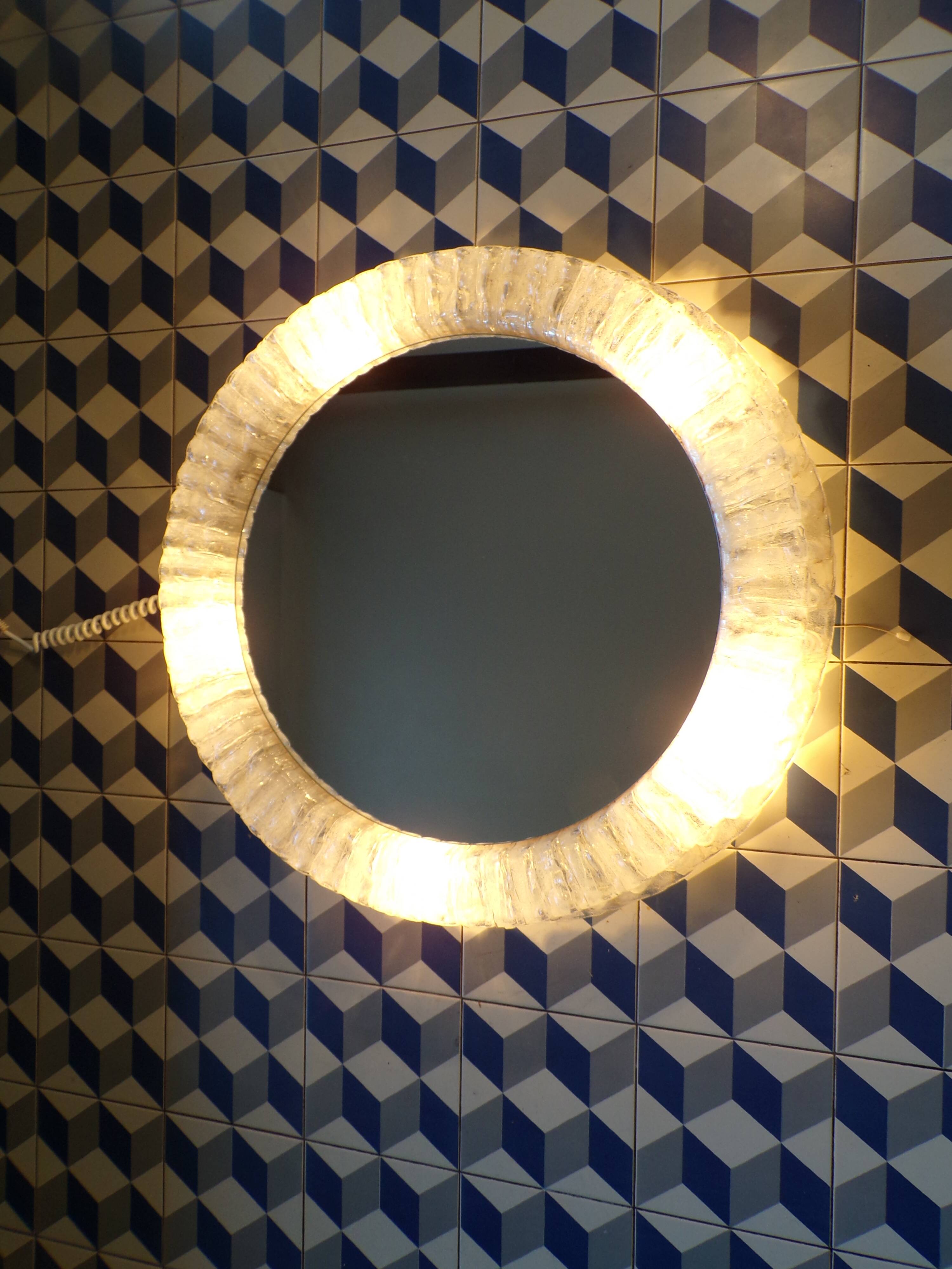 Retractable illuminated Hillebrand mirror