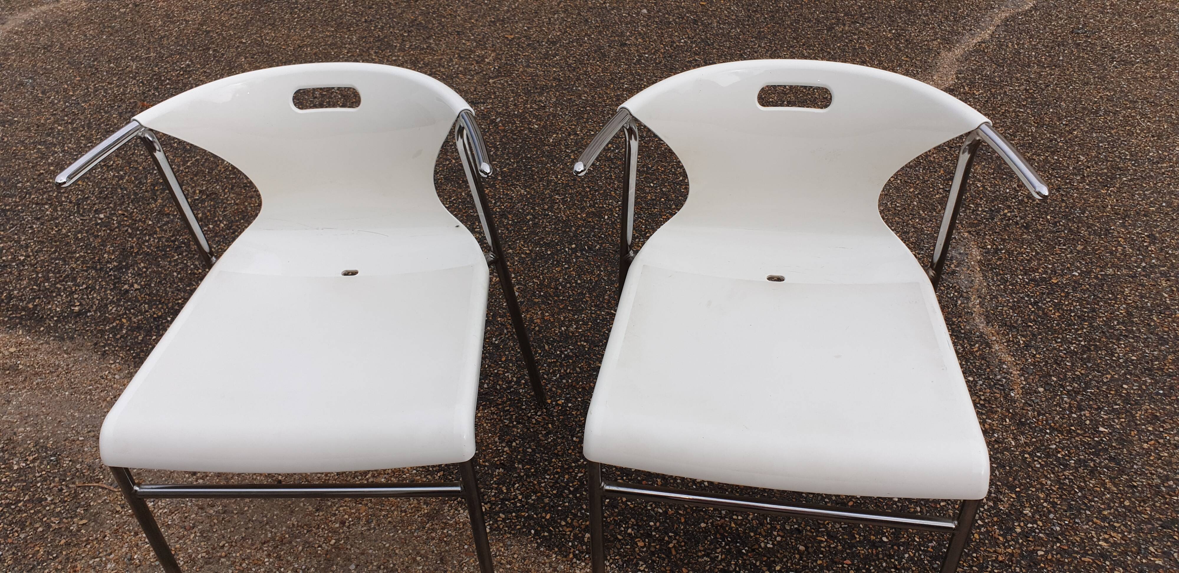 Pair of chrome and resin design armchairs