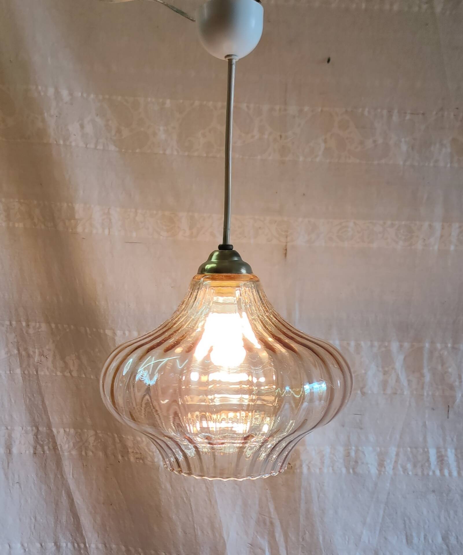 70's amber glass suspension design