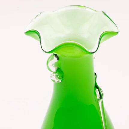 Excentric green blown glass vase with relief flowers Murano