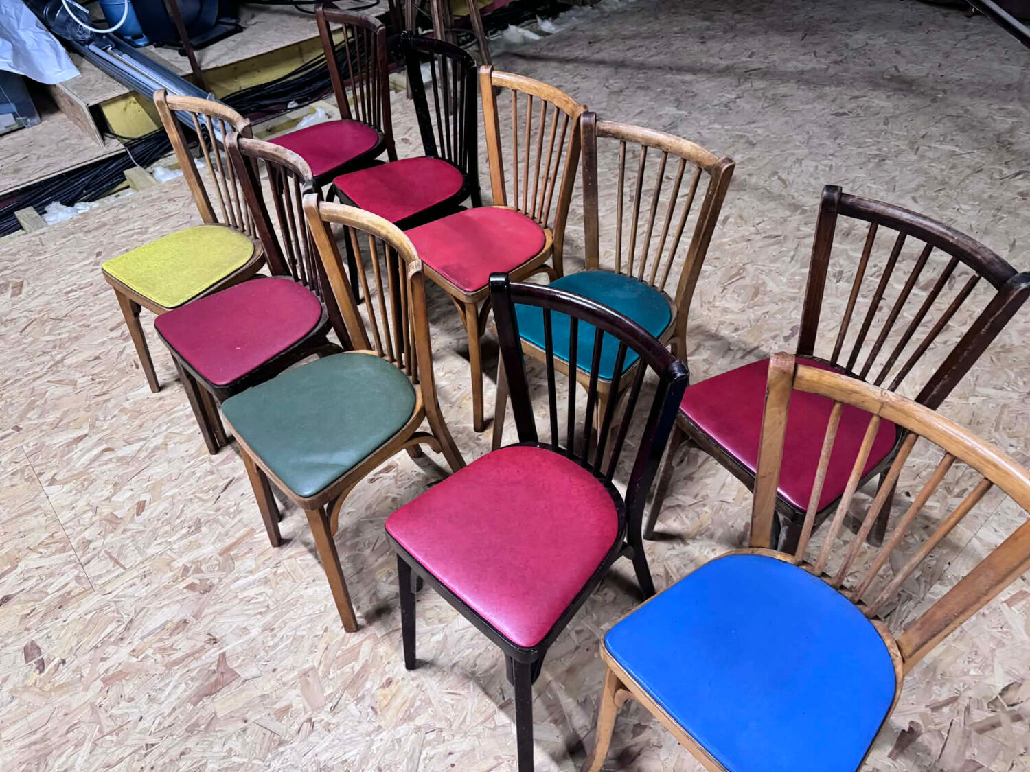 Set of 10 Baumann bistro chairs with curved wood and Skaï seat.