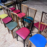 Set of 10 Baumann bistro chairs with curved wood and Skaï seat.