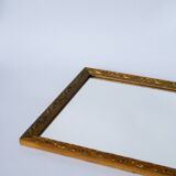 20th century wooden and gilded stucco mirror