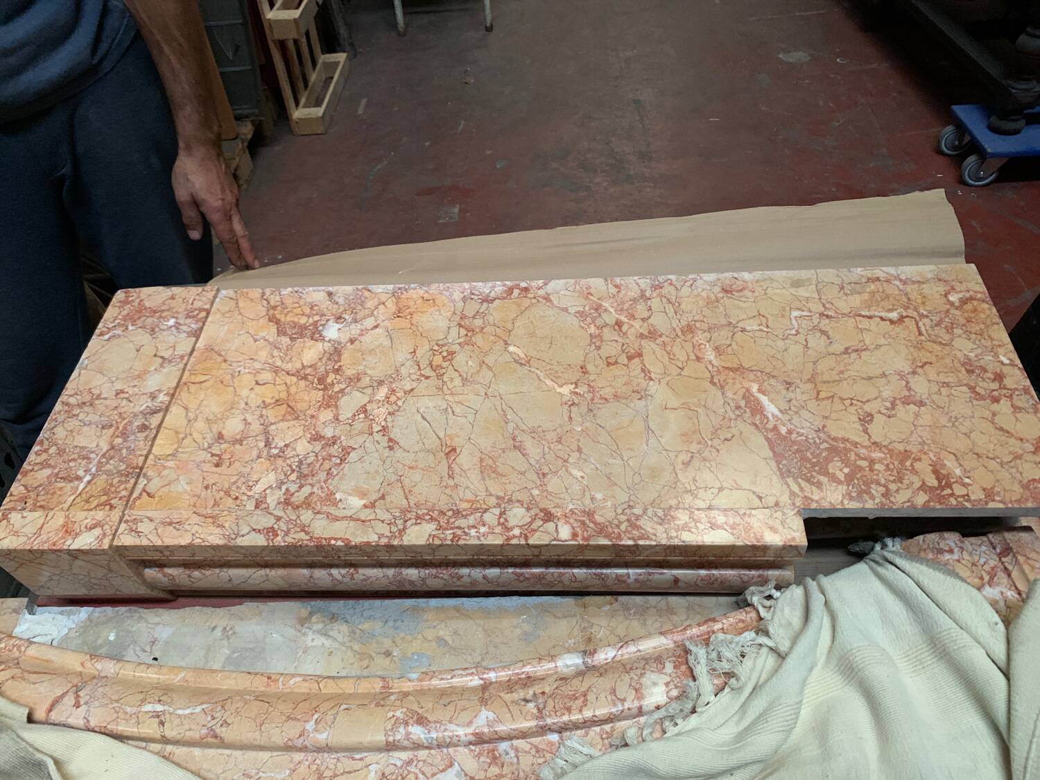 Louis XIV-style fireplace has 19th century veined pink marble hood