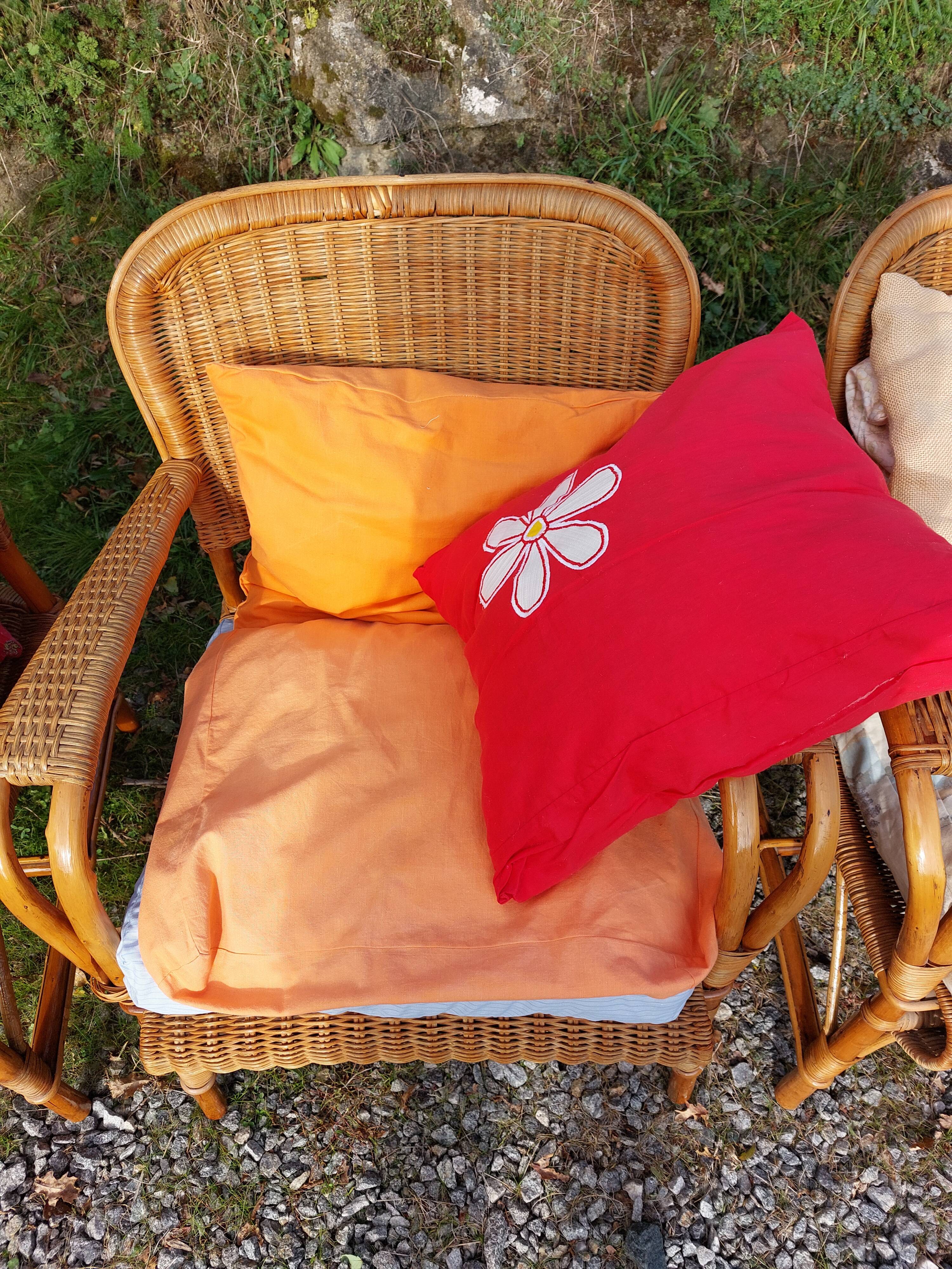 4 armchairs and a coffee table made of rattan and bamboo wood, vintage.