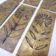 Six cleanliness plaques, flower design, brass.