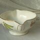 Sauceboat in earthenware decorated with four seasons vegetables.