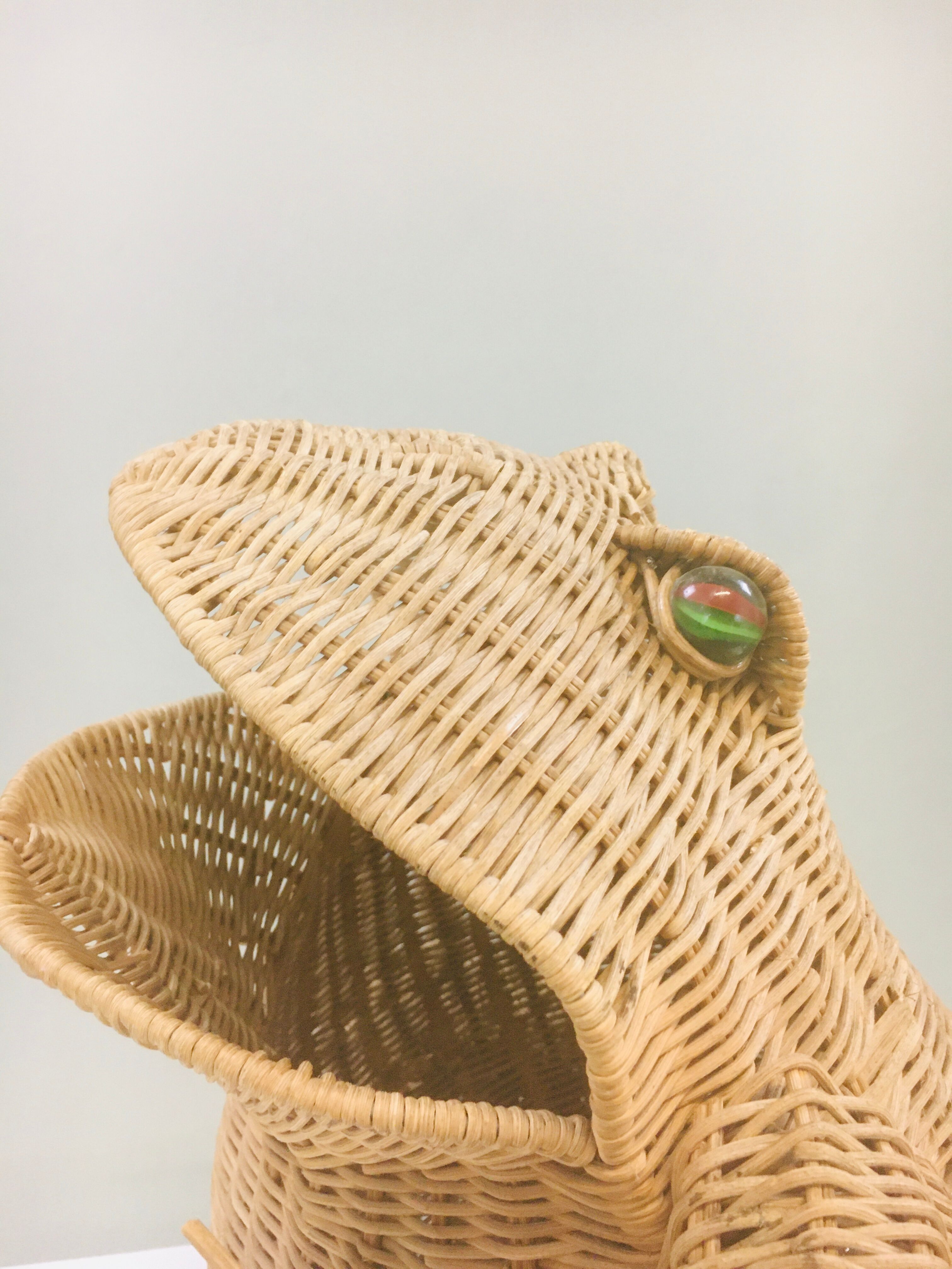 Olivier Cajan's frog magazine rack in 1975, wicker and rattan