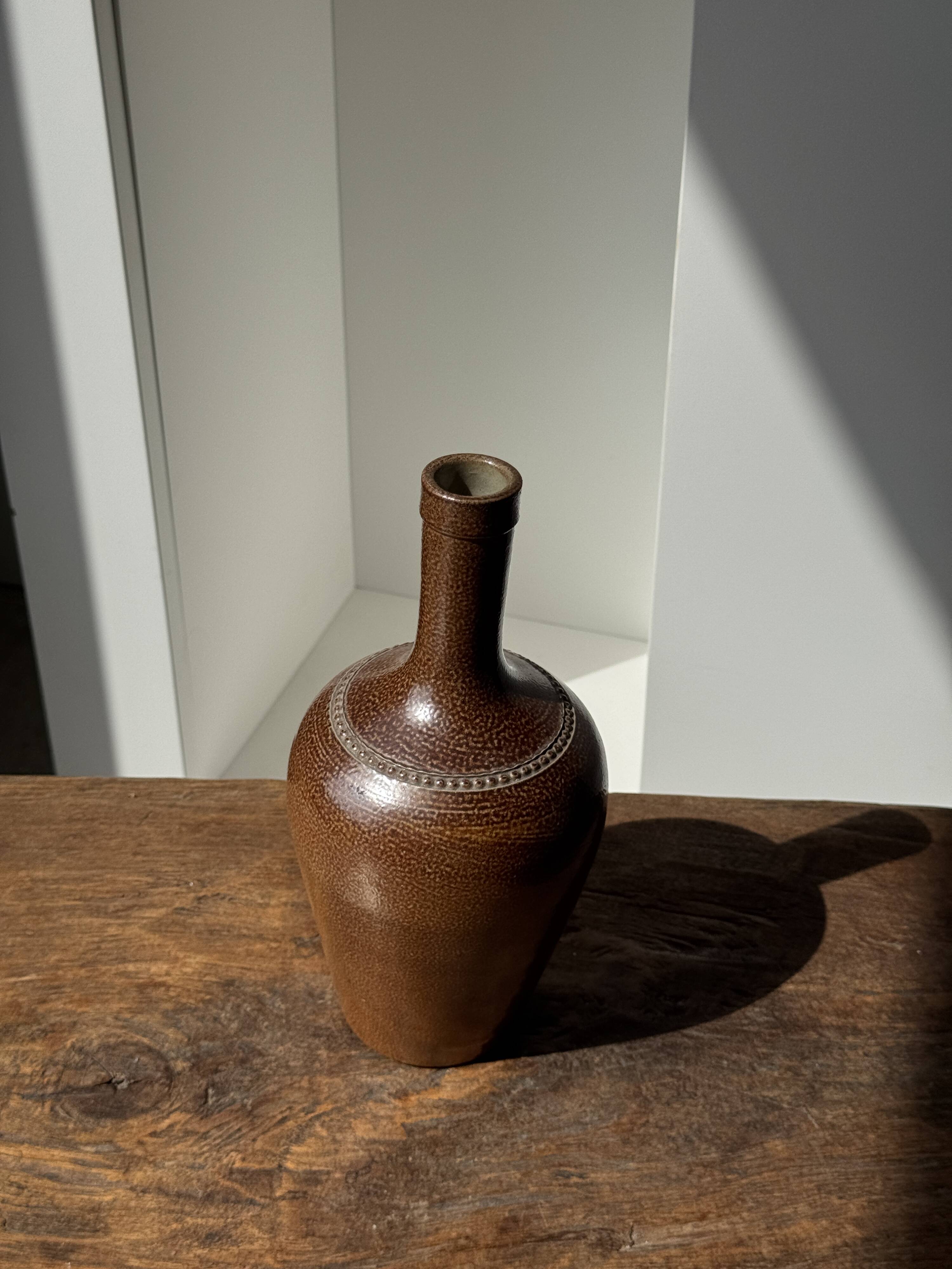 Sandstone demijohn in Pont des Vernes, France