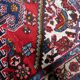 1950s handmade wool medallion rug, red and navy, 96 × 144 cm - 1C1290