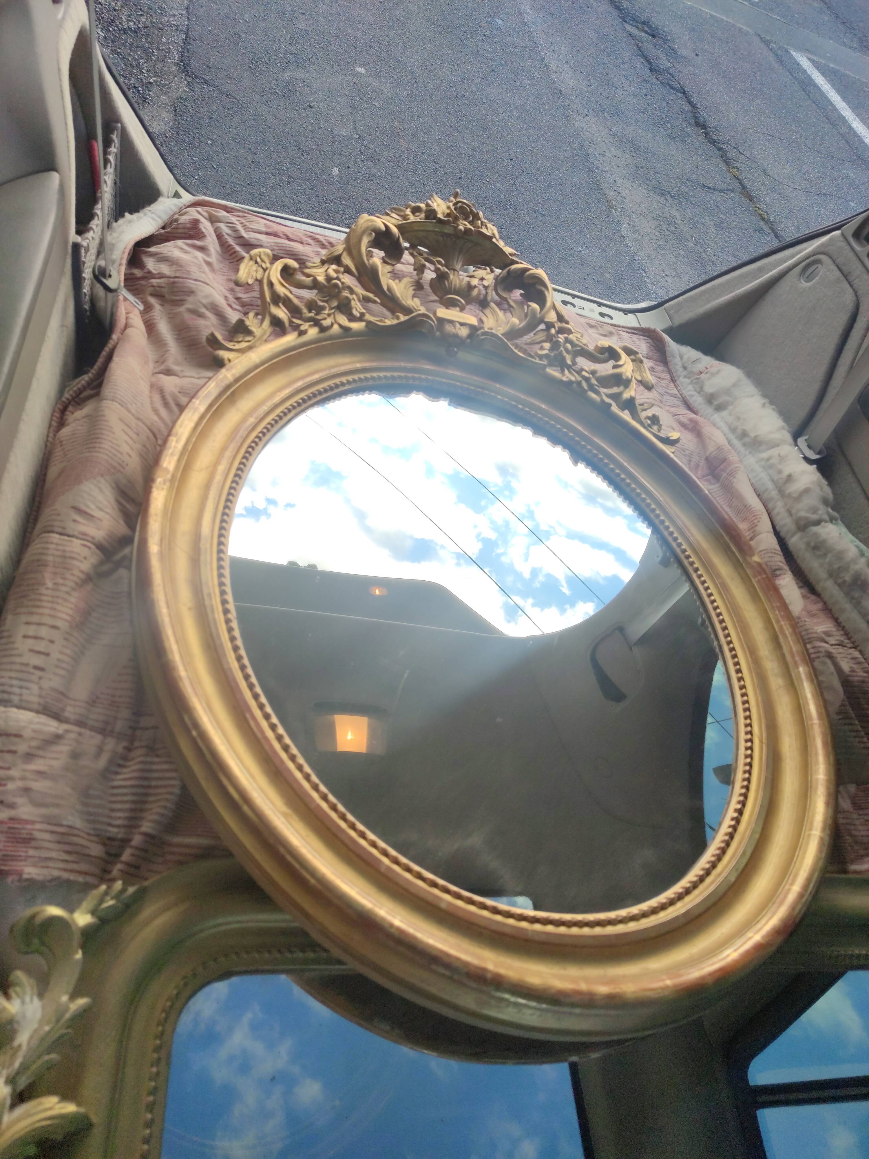 Mirror with a gilt medallion pediment, 1840