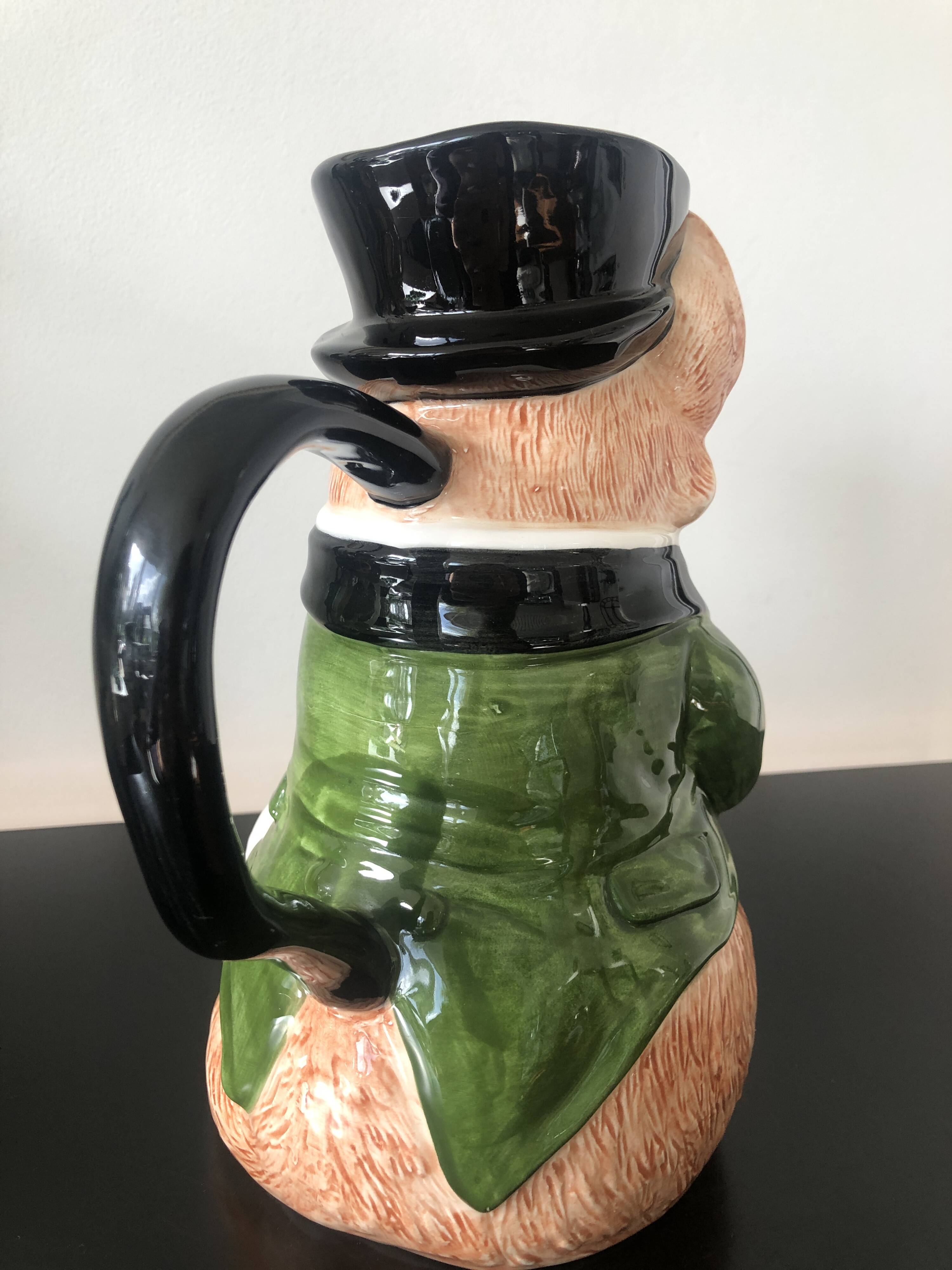 Ceramic jug representing a fox in hunting attire date 1986